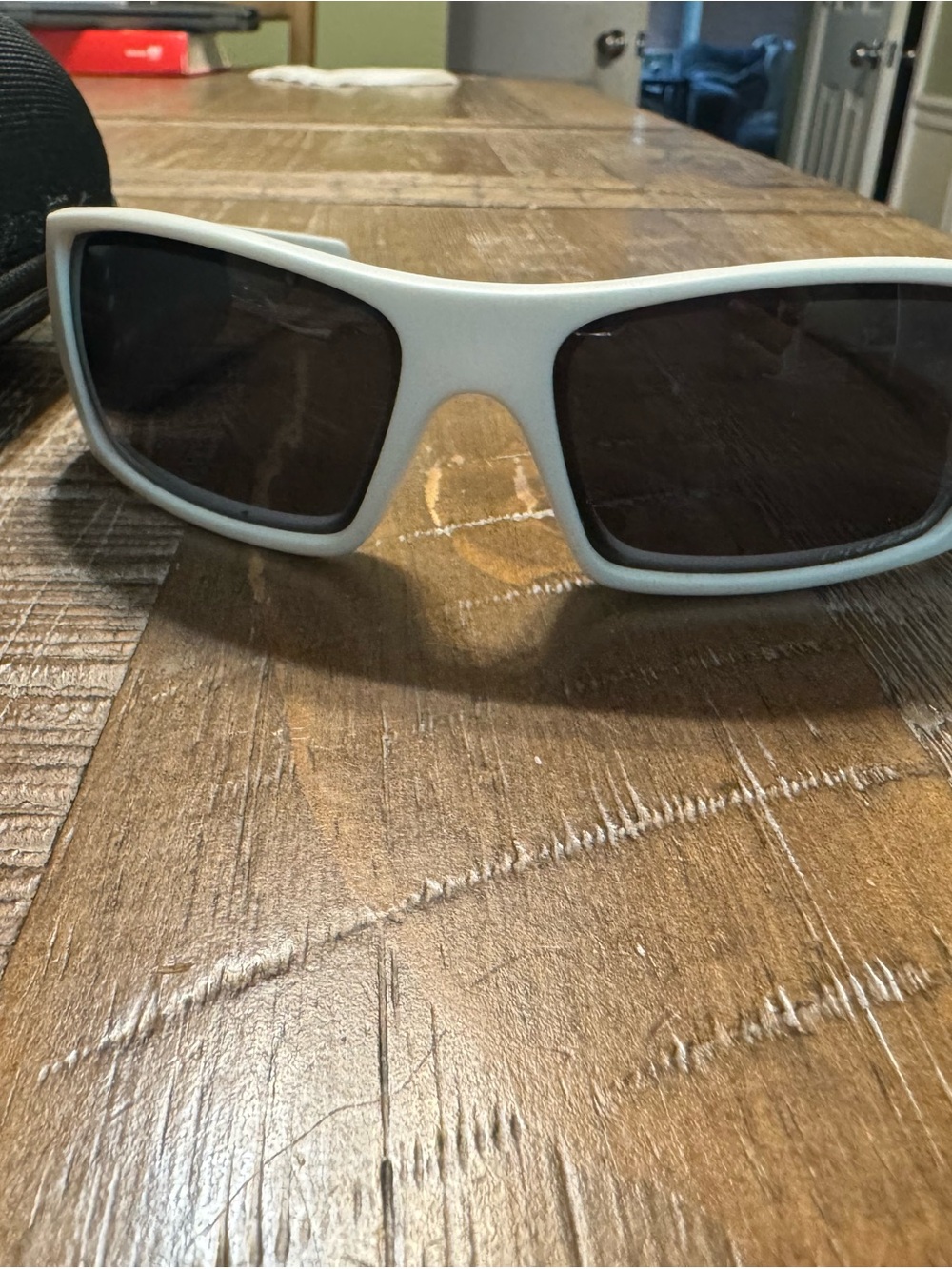 Oakley White Frame Sunglasses with Dark Lenses